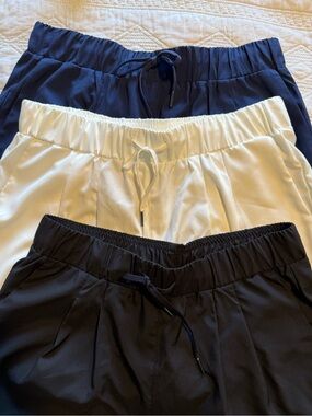 3 pairs HALARA Women's Pull-On lightweight pleate shorts Navy, White, and Black